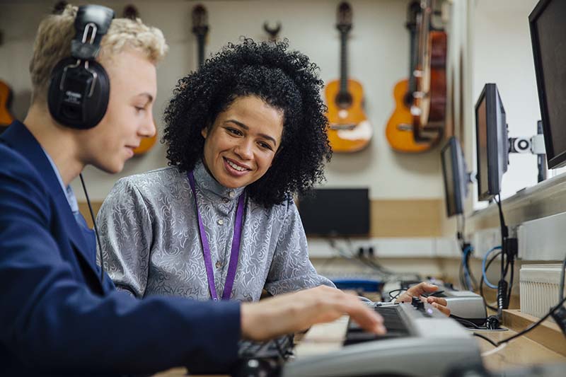student playing music