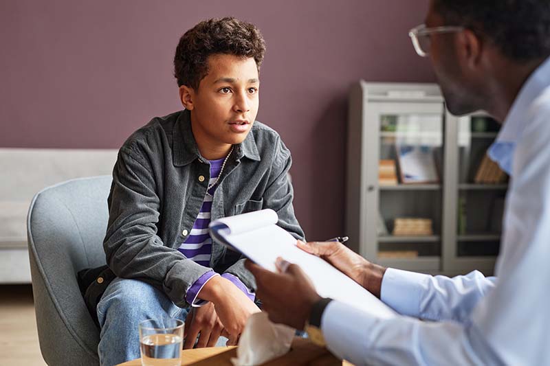 doctor speaking with patient